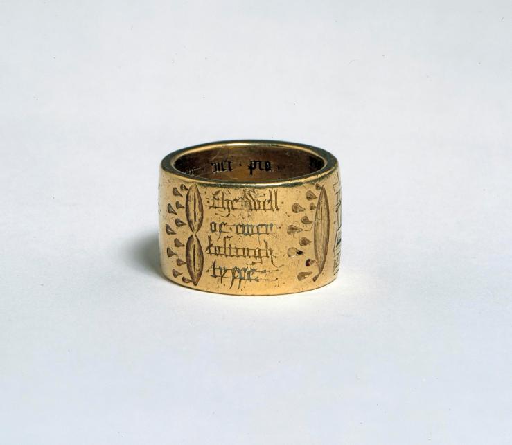 Gold ring with wounds of Christ
