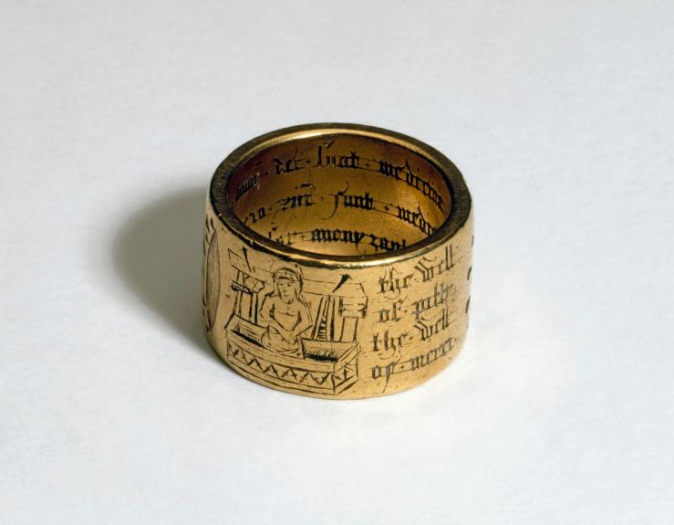 Gold ring with wounds of Christ