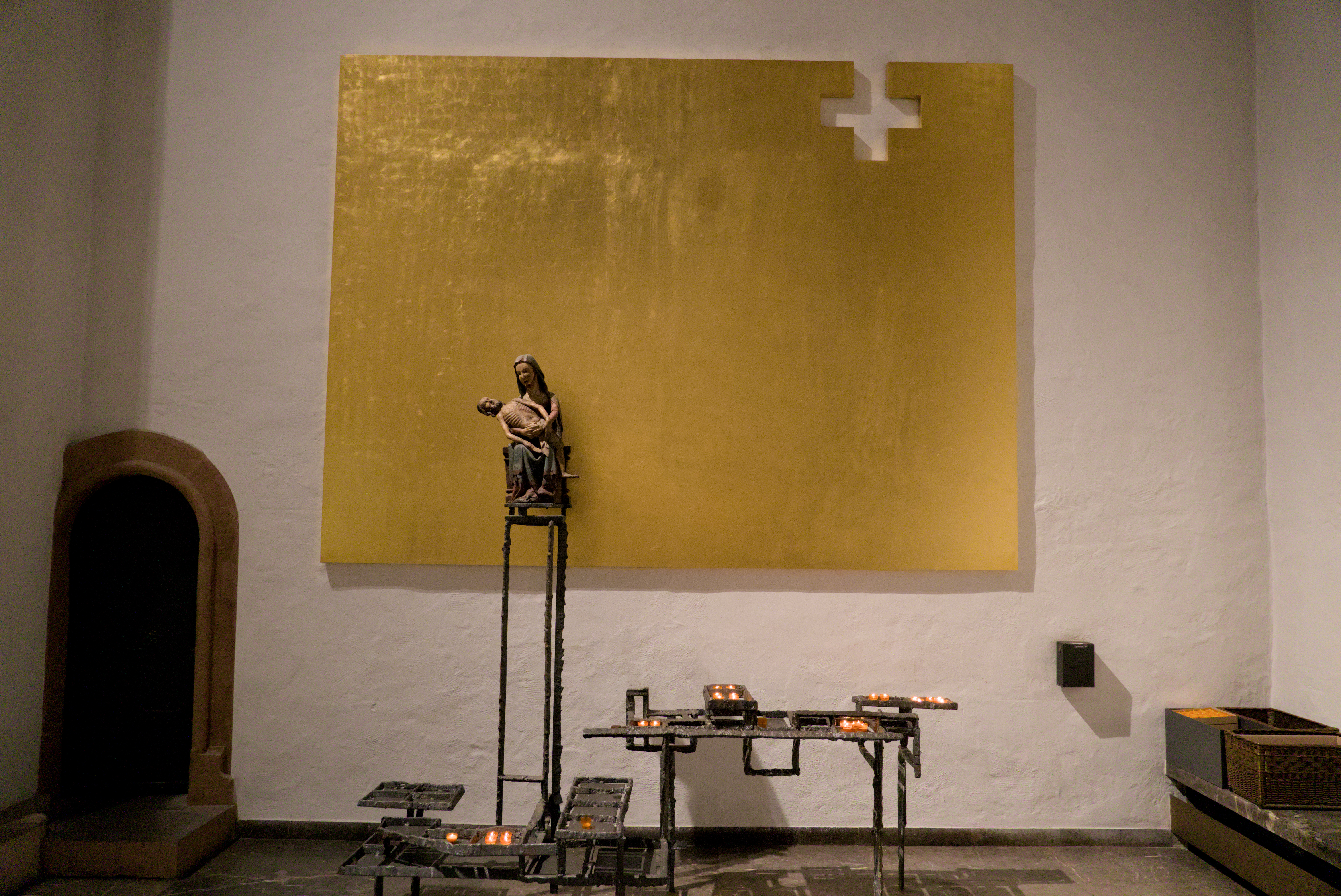 Pieta with golden wall plate